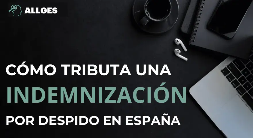 Cómo tributa una indemnización por despido improcedente en España. Imagen de escritorio con portátil, móvil y café.